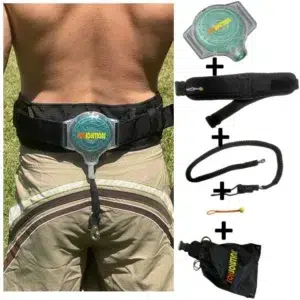 eFoilgc rider using the eFoilSolutions Retractable Waist Belt Leash Kit with all components visible, including shock cord, leash unit, quick-release tether, and waist belt.