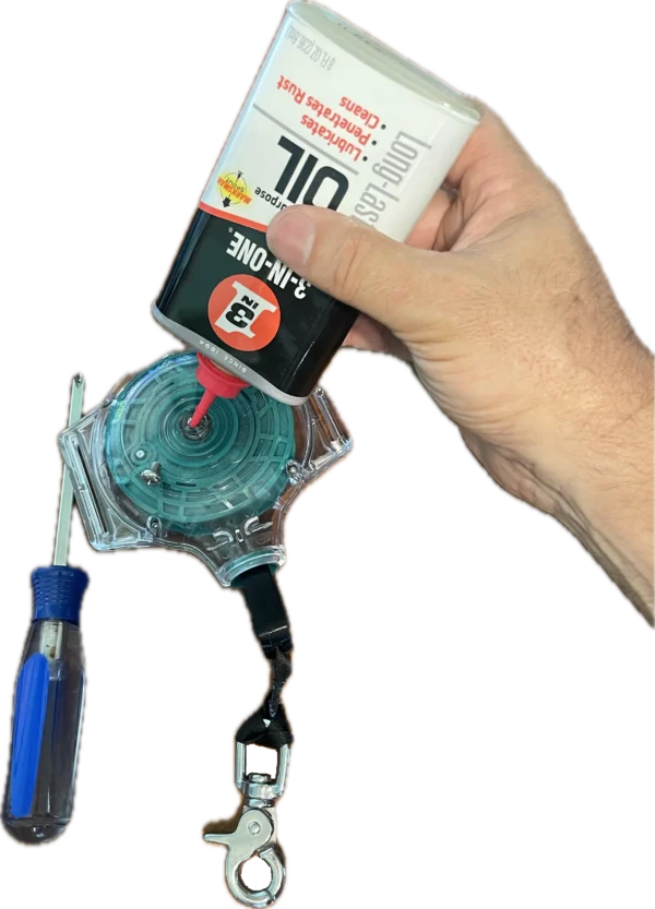 Close-up showing eFoilSolutions retractable leash coil being oiled through the maintenance port by an eFoilgc rider.